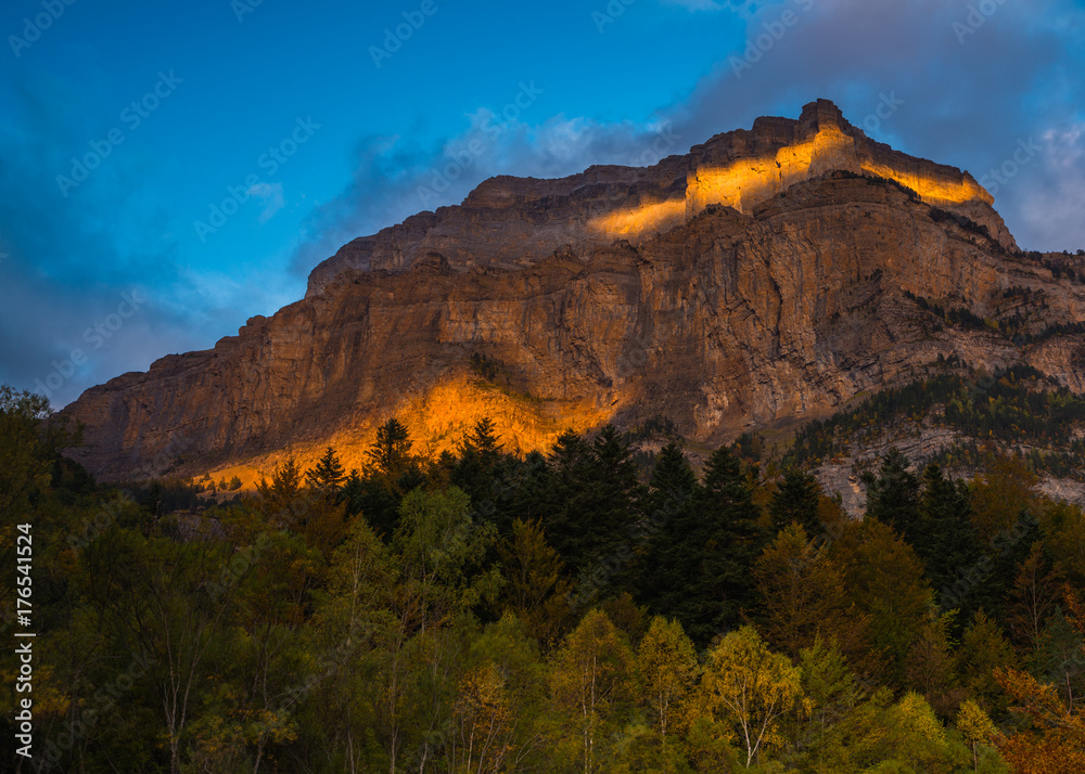 The last sunshine rays illuminating the Tozal de Mallo mountain in Ordesa National Park