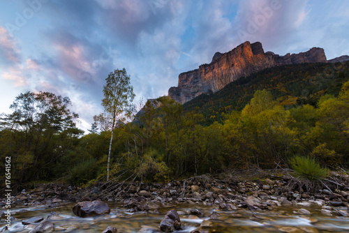 Sunset on Arazas river and Punta de Gallinero mountain at National Park of Ordesa