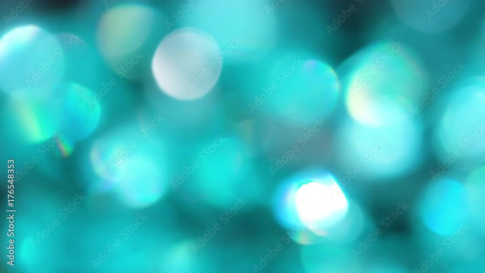The Circles Bokeh stock video features a circle rotation in a clockwise direction of turquoise blurred lights. You can use it as an overlay for creative video effects, artistic videos, and as a The Circles Bokeh stock video features a circle rotation in a clockwise direction of turquoise blurred lights. You can use it as an overlay for creative video effects, artistic videos, and as a