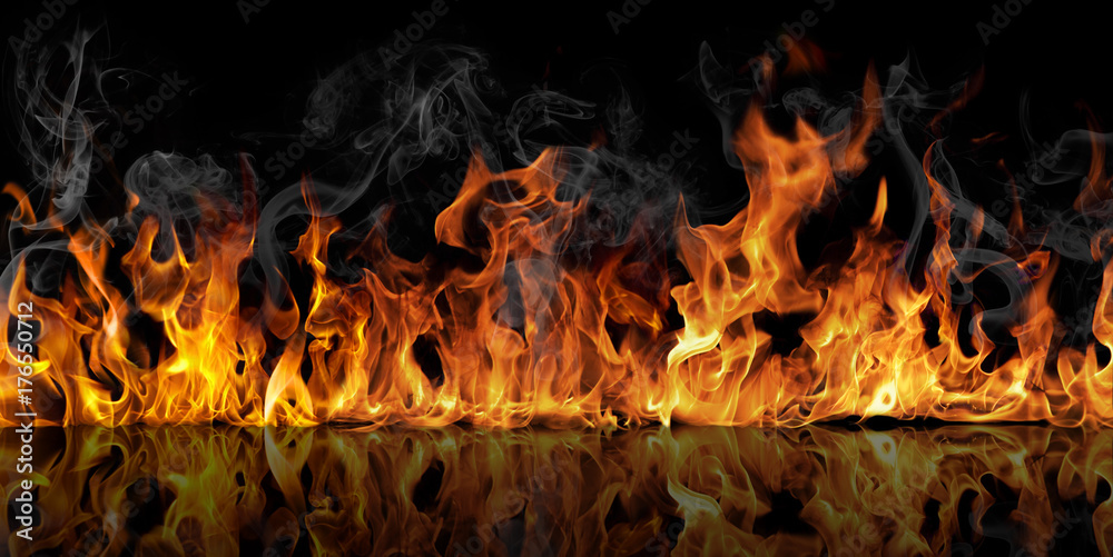 The texture of fire on a black background is reflected in a glossy table. - obrazy, fototapety, plakaty 