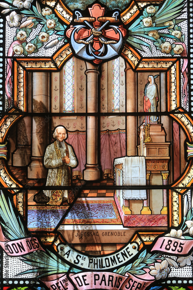 The Curé of Ars. Jean-Baptiste-Marie Vianney. Notre-Dame de la Salette. /  St. John Vianney. Stained glass window. Shrine of Our Lady of la Salette.  Stock Photo | Adobe Stock