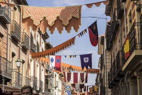 Flags, traditional medieval festival in the streets of Alcala de Henares, Madrid Spain photo