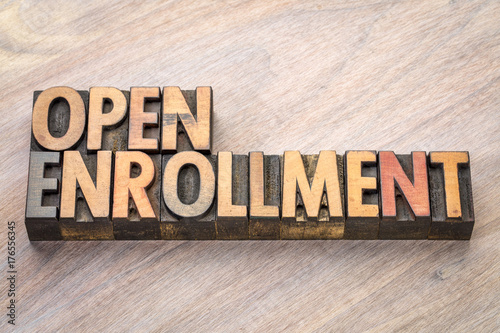 Fotografija open enrollment word abstract in wood type