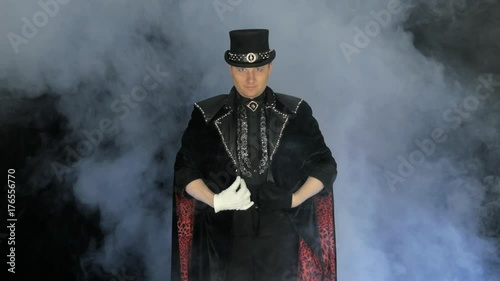 Magician and his cute assistants appearing