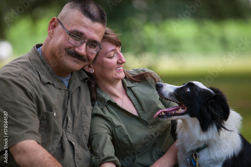 Couple in Park with Border Collie