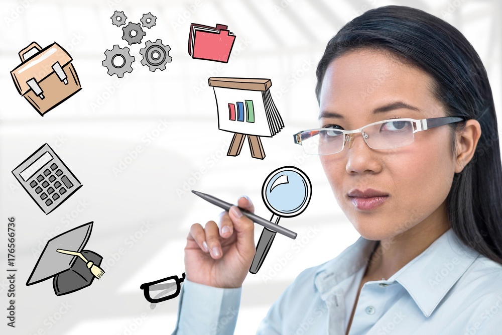 Fotografie Composite image of attractive businesswoman holding pen