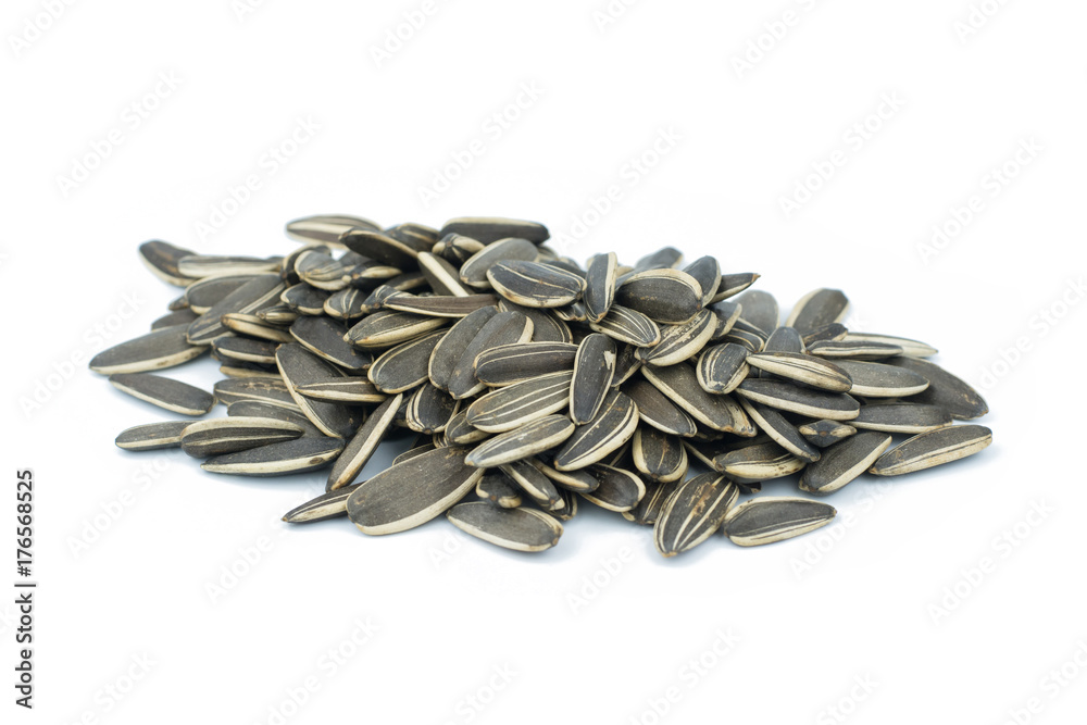 sunflower seeds pile isolated on white background sunflower seeds pile isolated on white background