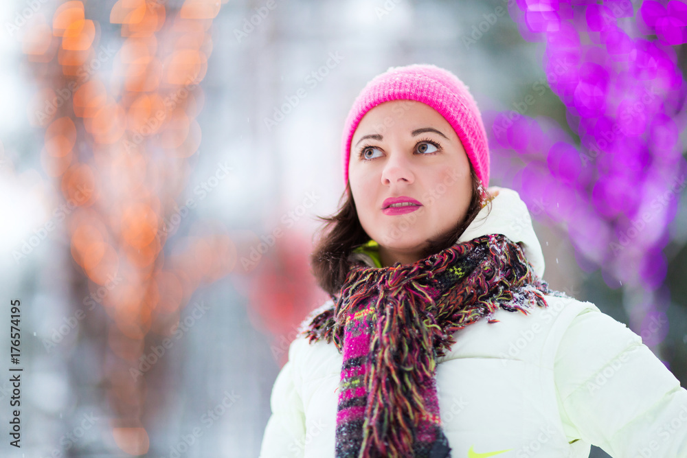 Happy winter women in park snow Christmas lights Happy winter women in park snow Christmas lights