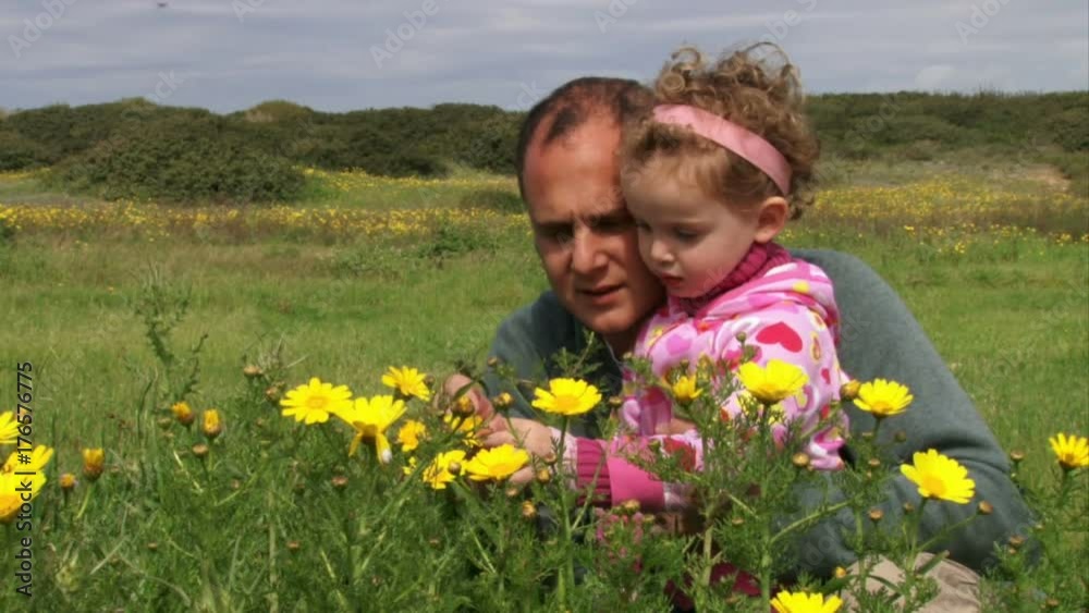 Dad & Daughter Watching Flowers Dad & Daughter Watching Flowers