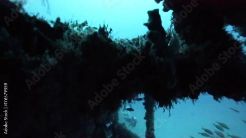 Scuba divers exploring the inside of the USS Spiegel Grove wreck, in the Florida Keys.  photo