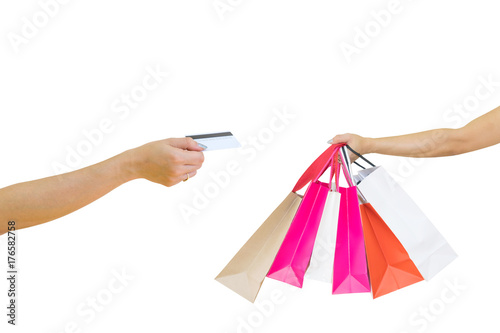 Female walks hands holding shopping bags and credit card isolated on a white background