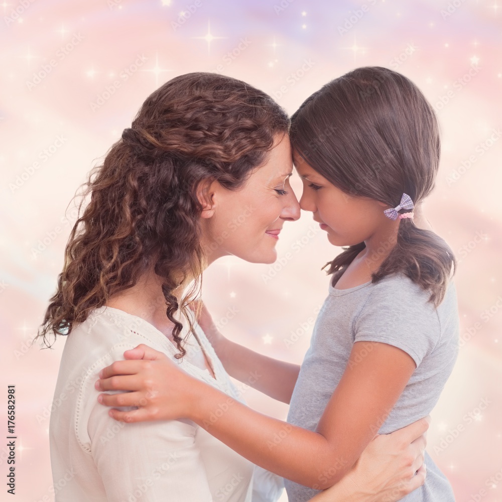 Portrait of mother and daughter holding each other Portrait of mother and daughter holding each other