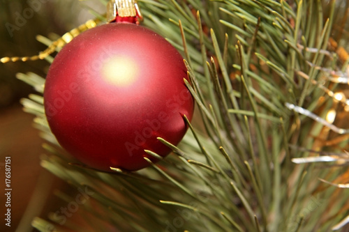 New Year's toys on Christmas tree for Christmas photo