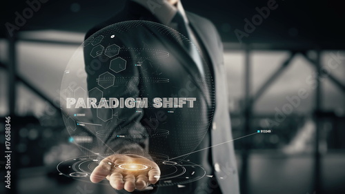 Paradigm Shift with hologram businessman concept