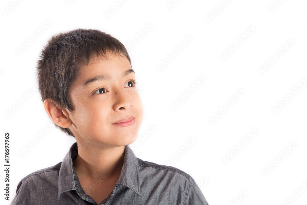 Portrait of little boy with smile and handsome face looking up side Portrait of little boy with smile and handsome face looking up side