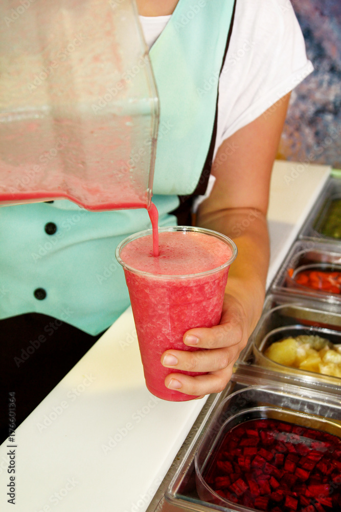 Different Smoothies with Straws in Plastic Cups and Fresh Fruits