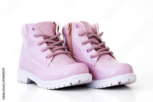 Pink boots isolated on a white background