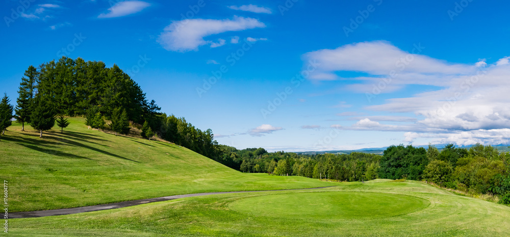 Golf Course where the turf is beautiful and green in Hokkaido, Japan. Golf is a sport to play on the turf Golf Course where the turf is beautiful and green in Hokkaido, Japan. Golf is a sport to play on the turf