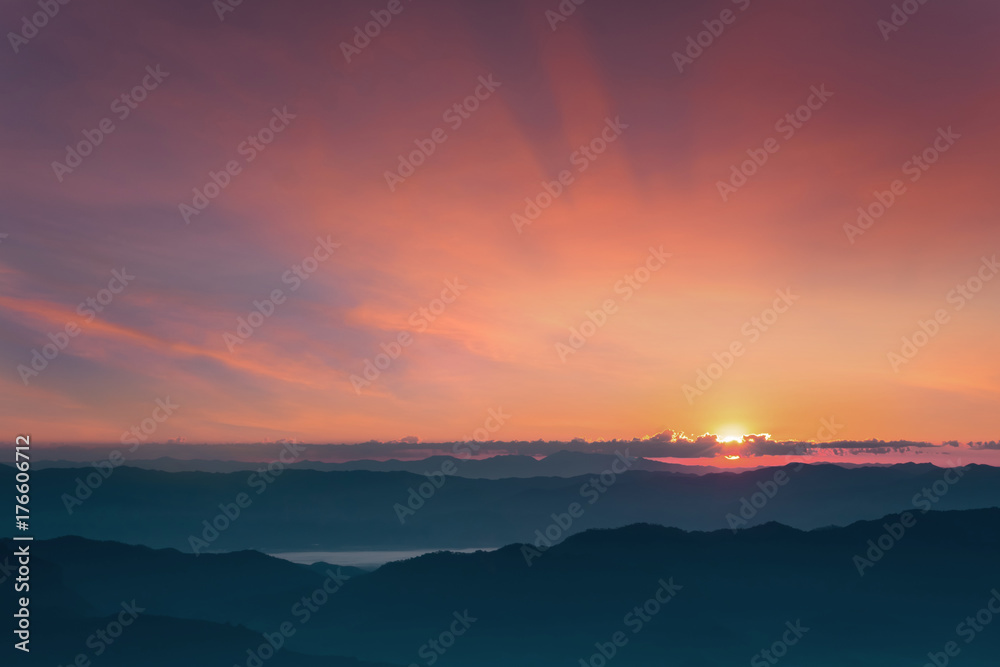 Landscape panorama dramatic sunset and sunrise sky on mountain layer.
