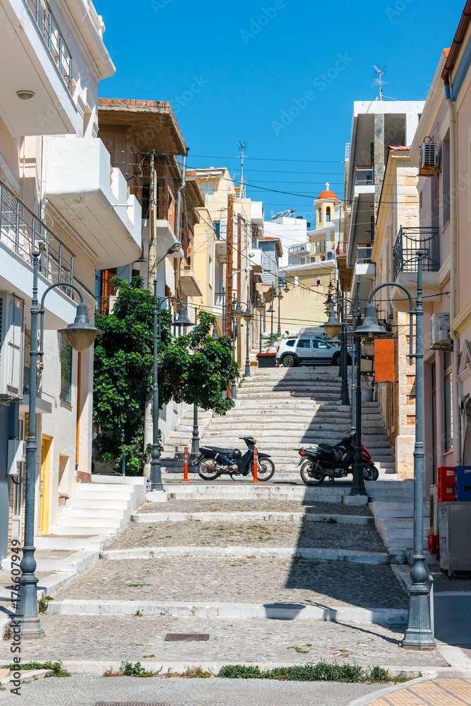 Street with steps in Sitia town, Crete island, Greece