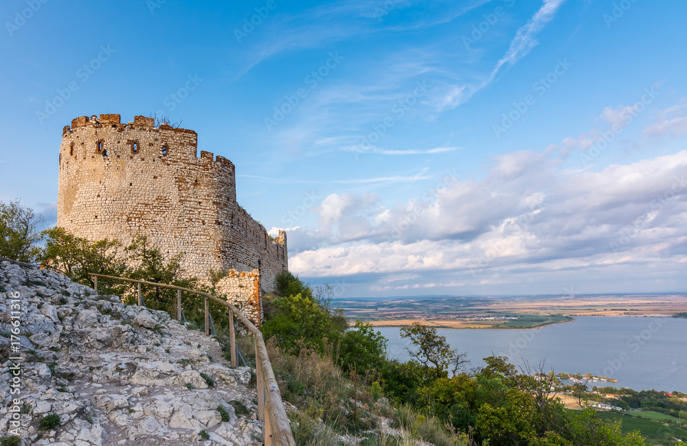 Castle in Palava, Czech republic, ruins of wall, landscape panorama of near village