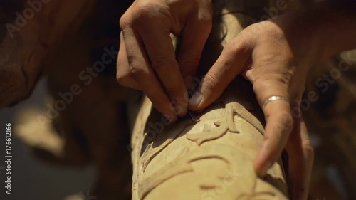 Beautiful woodcarving close up sunny studio rapid slow motion