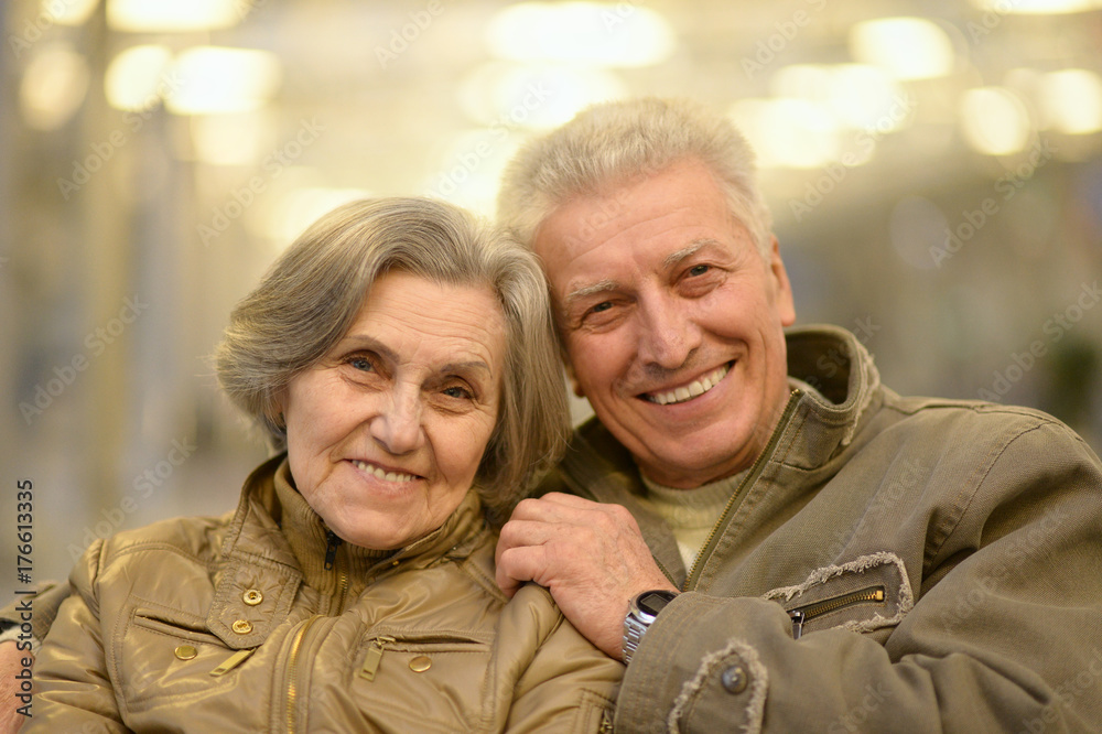 senior couple hugging in the park senior couple hugging in the park