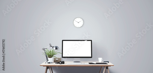 Computer display and office tools on desk. Desktop computer screen isolated. Modern creative workspace background. Front view