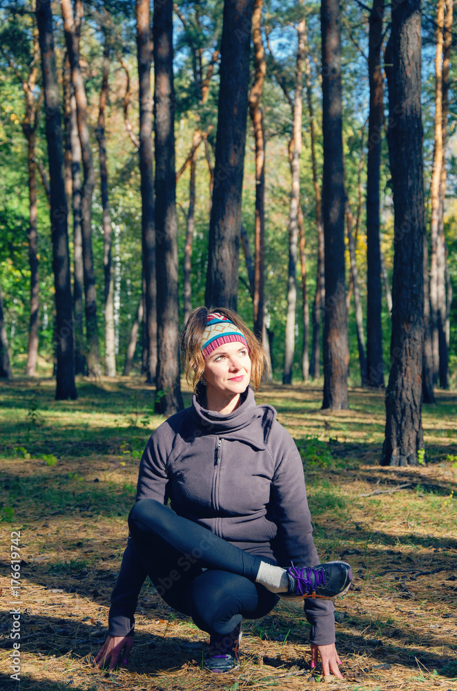 girl doing yoga in the woods girl doing yoga in the woods