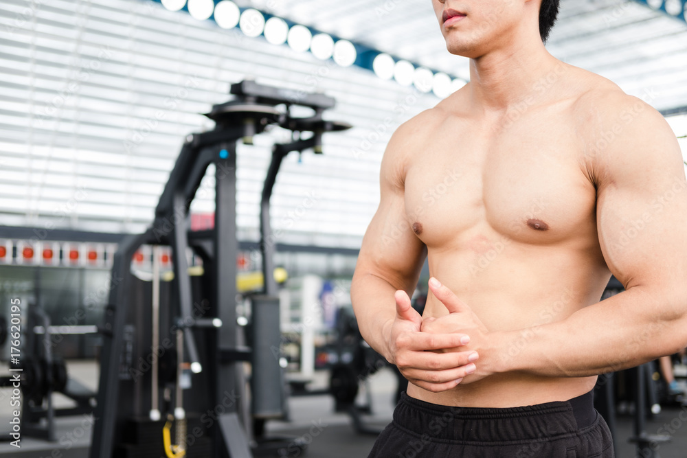 man athlete prepare for training in gym. bodybuilder male working out in fitness center. sport guy doing exercises in health club. man athlete prepare for training in gym. bodybuilder male working out in fitness center. sport guy doing exercises in health club.