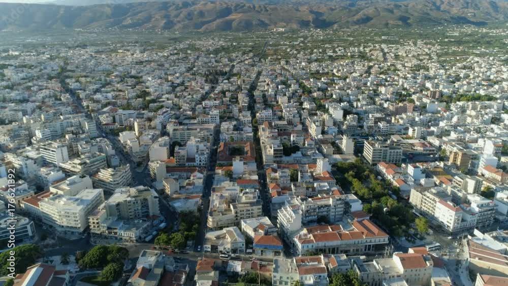 Flying above Chania city buildings in Crete, Greece. High angle view Flying above Chania city buildings in Crete, Greece. High angle view