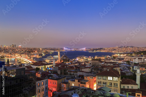 Istanbul view from down town of the city during the twilight with beatiful atmospheric blue sky and city lights