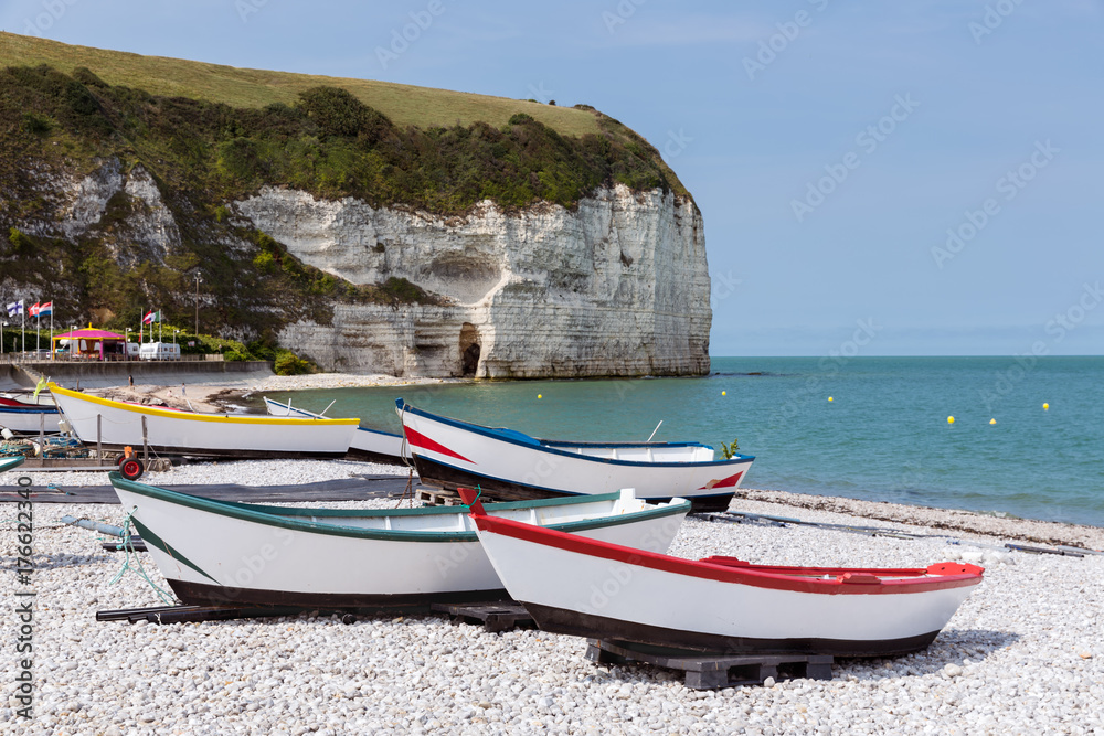 Fishing boats with fishing equipment at the beach near cliffs of Yport in Normandie, France