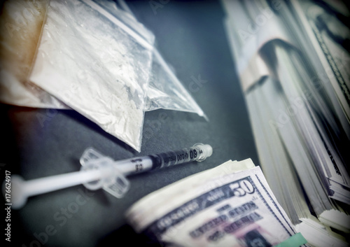 Drug bag along with some dollar bills, conceptual image