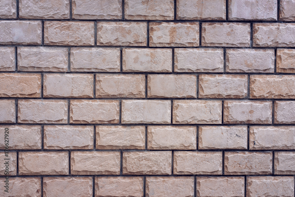 Brick wall made of red stone background. The spoiled brick is vintage. Brick wall made of red stone background. The spoiled brick is vintage.