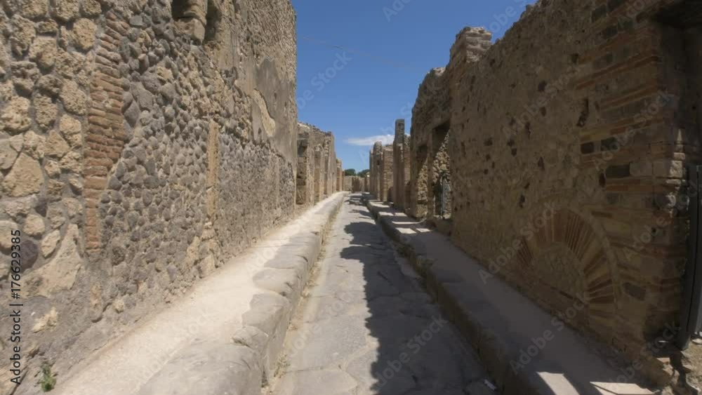 Street of ancient Pompeii with the destruction of buildings. Street of ancient Pompeii with the destruction of buildings.