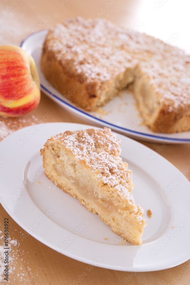 piece of apple pie with crumbles piece of apple pie with crumbles