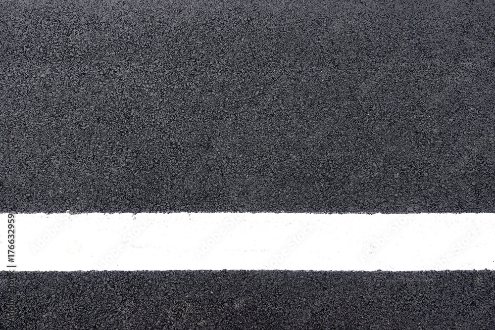 white lines on the asphalt road surface background texture