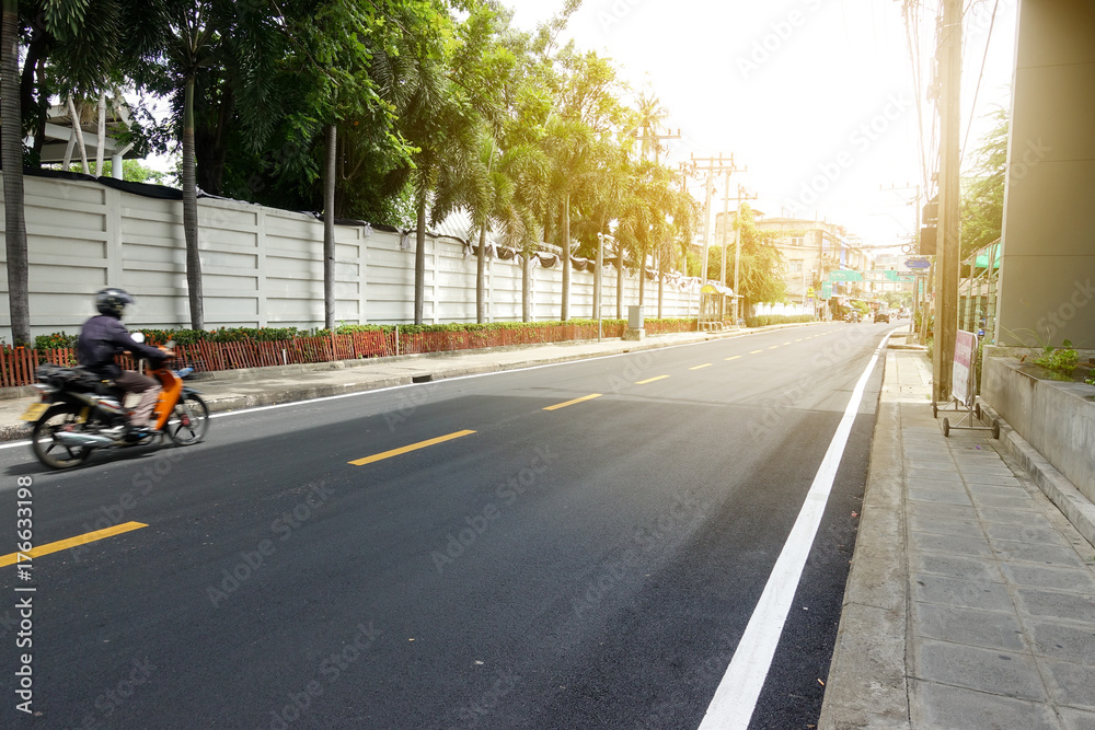 Asphalt road in the alley connected to the main road in Bangkok.