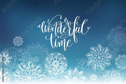 wonderful time hand lettering inscription on snowflakes