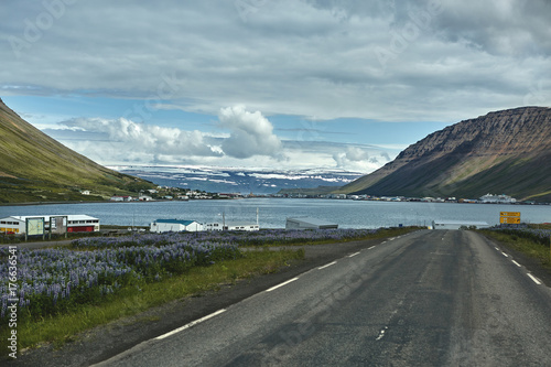 Travel to Iceland. A mountain road to the town of Isafjordur and a view of the fjord