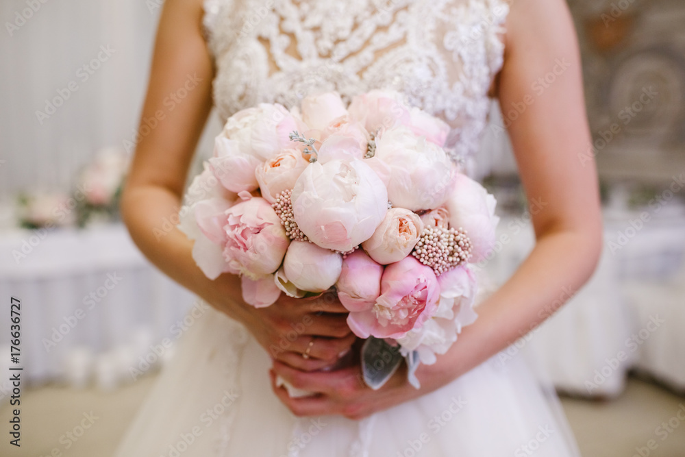 Wedding bouquet in bride's hands Wedding bouquet in bride's hands