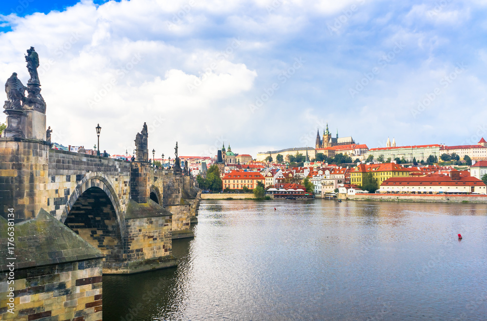 Prague Castle. The Charles Bridge. Medieval fortress. The Vltava River. Cathedral of St. Mikulas. Red tiled roofs
