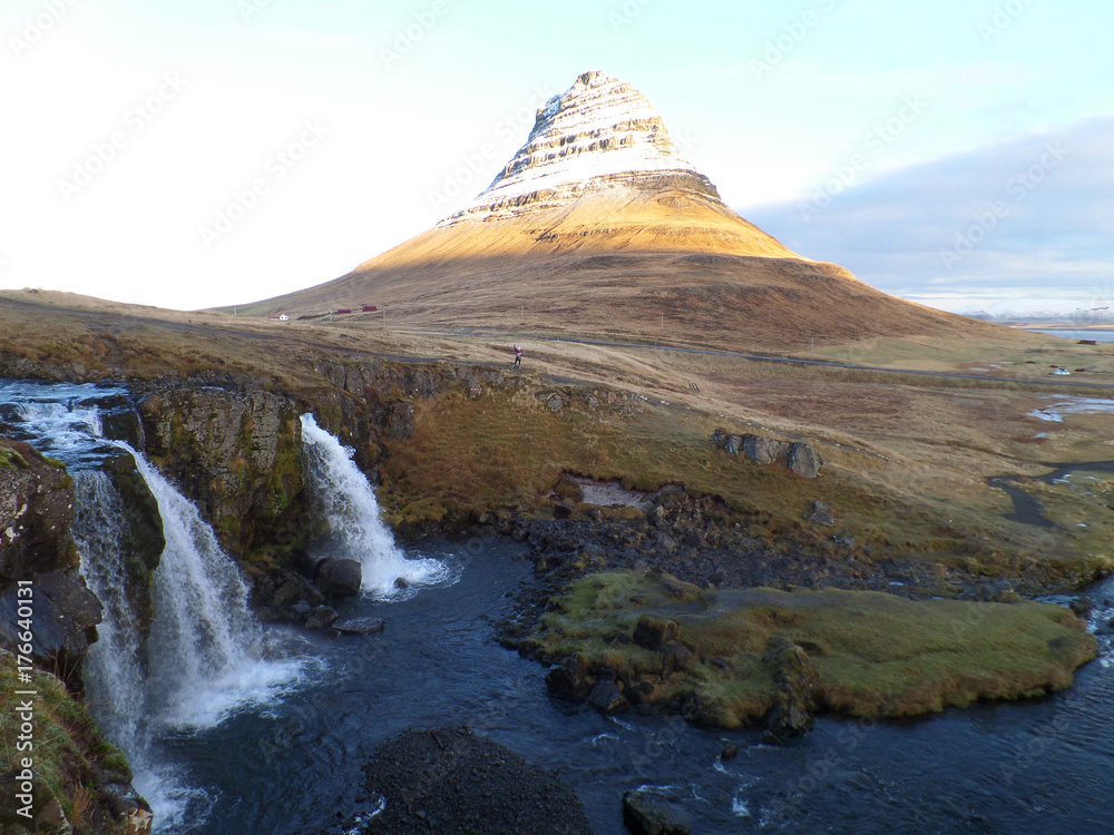 Kirkjufell Mountain and Kirkjufellsfoss Waterfall in the Morning Sunlight, Snaefellsnes Peninsula, Iceland