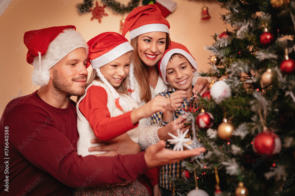Family Decorating Christmas Tree Family Decorating Christmas Tree