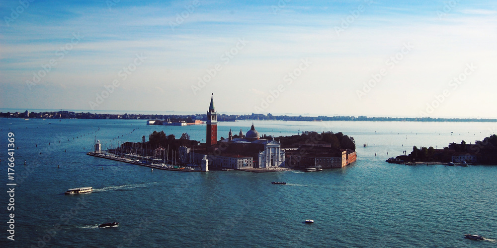 Aerial view at San Giorgio Maggiore island from the top of the bell tower at the San Marco Square. View on the Gulf of Venice from Campanile. Italy.