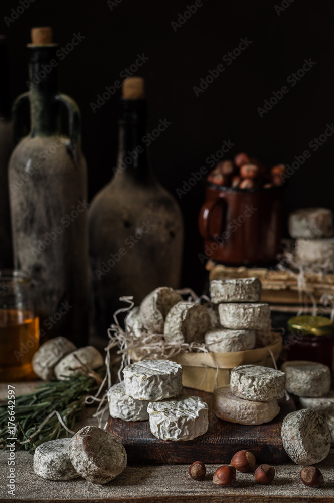 Variety of French Cheeses in a Dusty Pantry