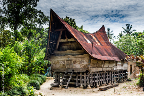 Traditional Batak longhouse on the shores of Lake Toba, Sumatra