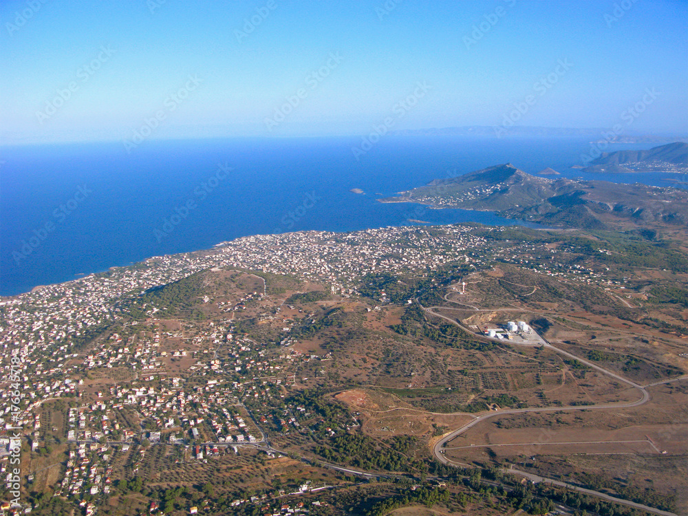 Suburbs of Athens, Aegean sea and mountains from aerial view. Seascape and landscape of Greece. 