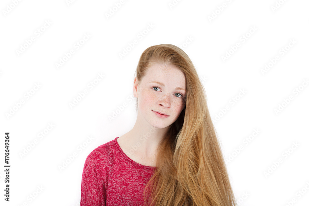Beauty portrait of young adorable fresh looking redhead woman with freckles gorgeous extra long hair. Emotion and facial expression concept. Beauty portrait of young adorable fresh looking redhead woman with freckles gorgeous extra long hair. Emotion and facial expression concept.